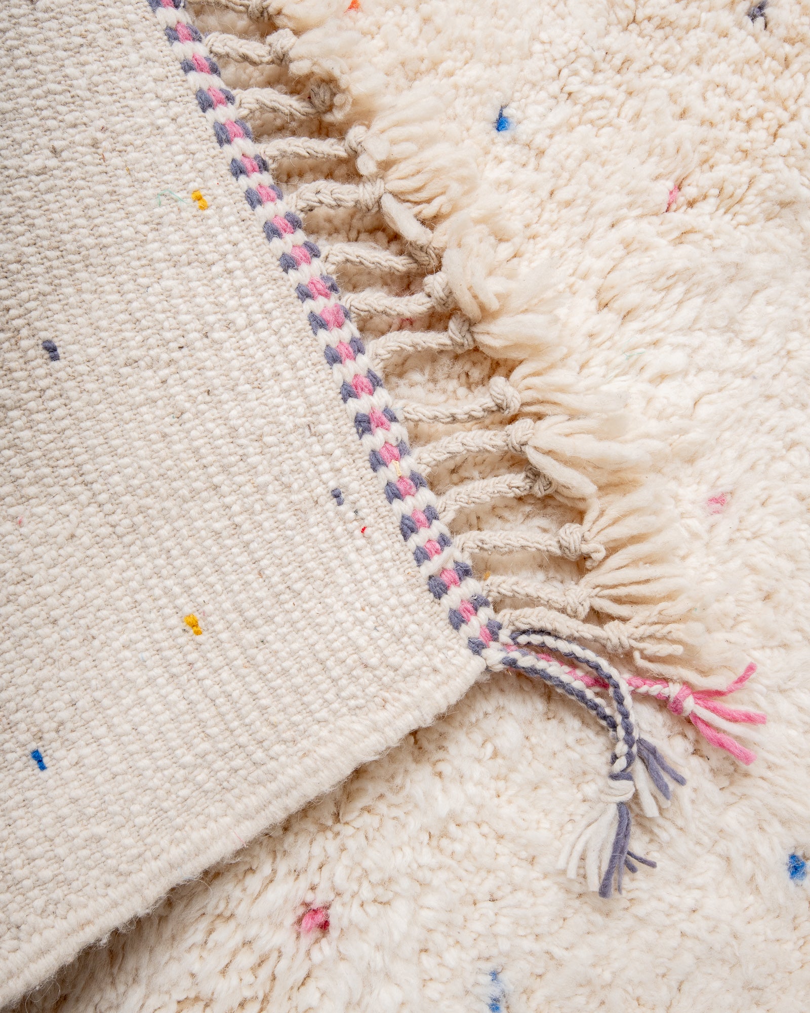 Modern, designer, handcrafted Berber rug from Morocco. Beniourain carpet with beautiful colours and patterns and fluffy wool texture.